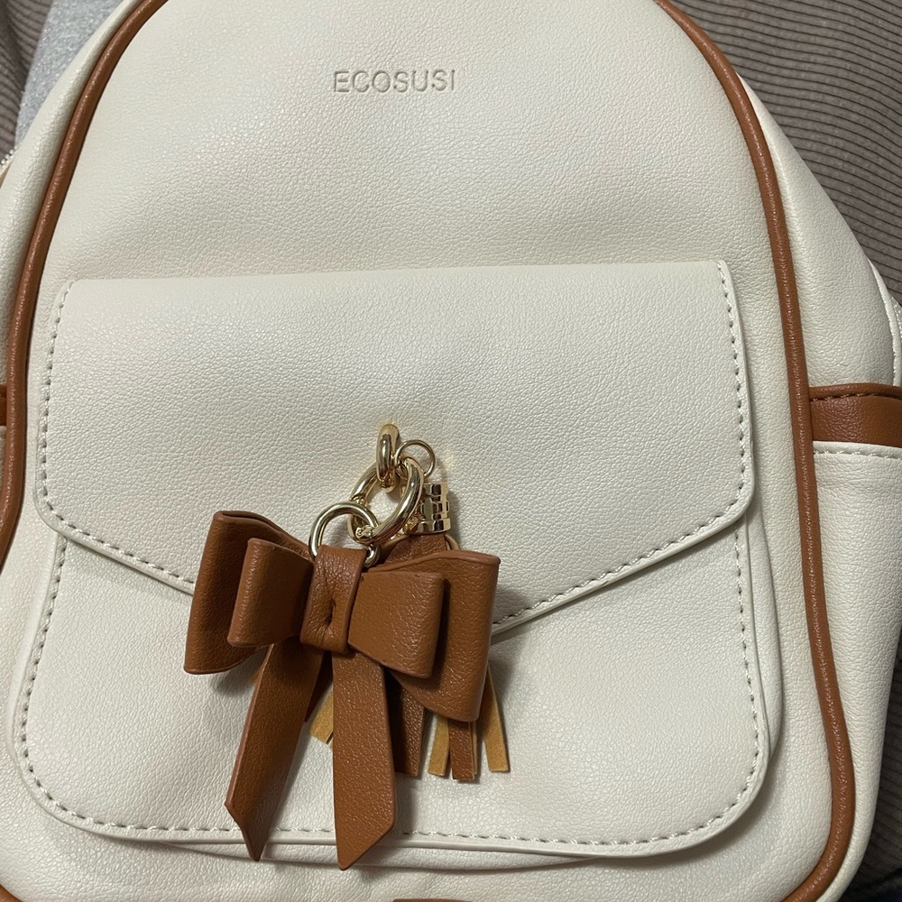 Mini cream colored backpack